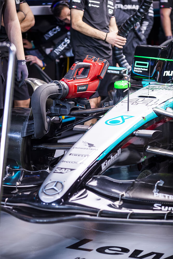 Einhell tool placed onto the formula 1 mercedes race car